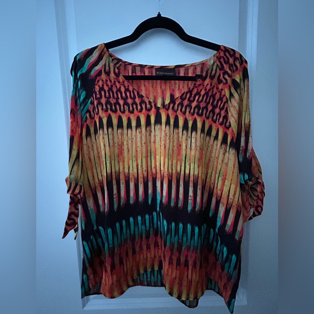 212. Bold elements blouse